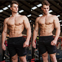 2020 nowych mężczyzna siłownie Fitness luźne spodenki kulturystyka biegaczy lato szybkoschnący fajne szorty spodnie męskie Casual plaża marki spodnie dresowe 3